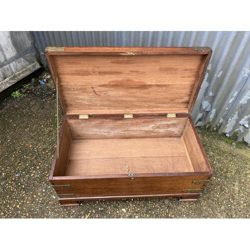 162 - A hardwood brass bound trunk with key 92x47x44