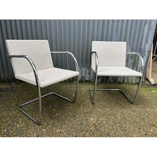 164 - A pair of good quality designer chrome framed chairs labelled KNOLL STUDIO