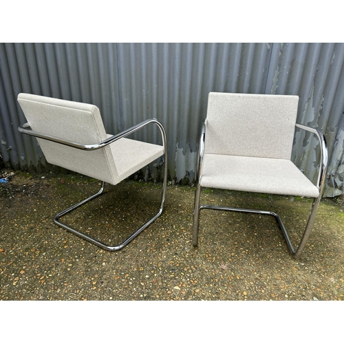 164 - A pair of good quality designer chrome framed chairs labelled KNOLL STUDIO