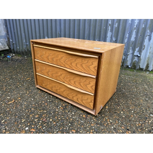 181 - A danish style teak chest of three 65x40x65