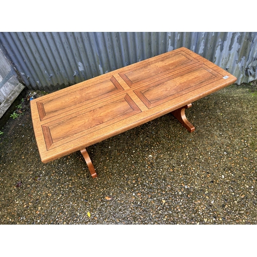 19 - Mid century teak height adjusting table with wind up mechanism labelled to underside Emu