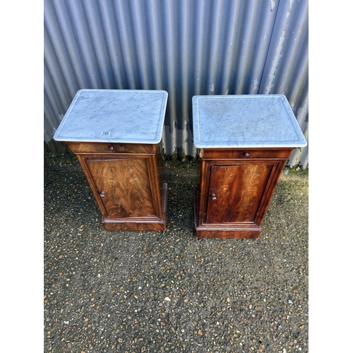 199 - A pair of continental mahogany single drawer bedsides with white marble tops