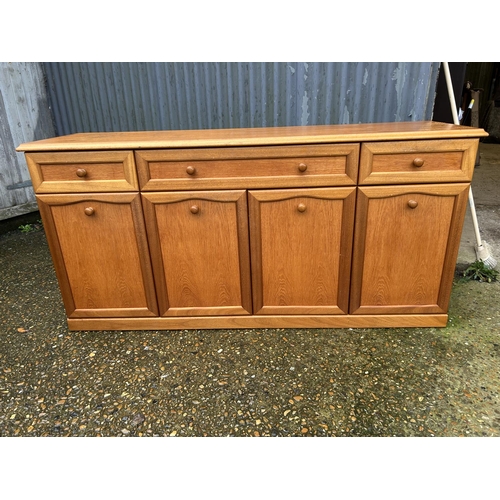 20 - Teak three drawer sideboard , 158 cms wide