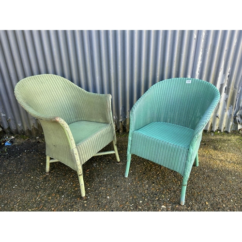 205 - Two green Lloyd loom bedroom chairs