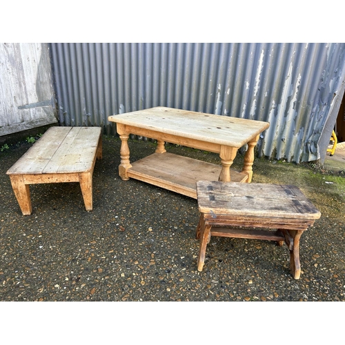 206 - A large solid pine coffee table together with two smaller country pine occasional tables