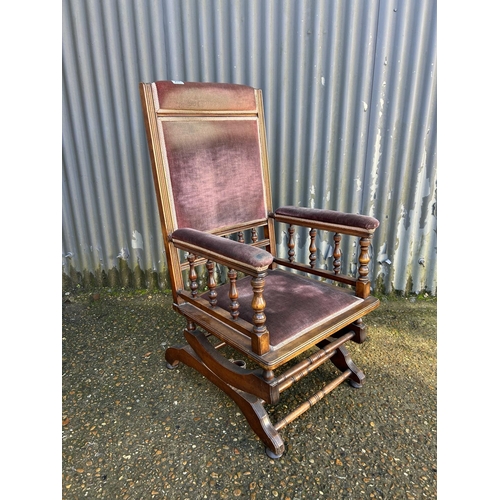 207 - An Edwardian mahogany framed spring rocking chair