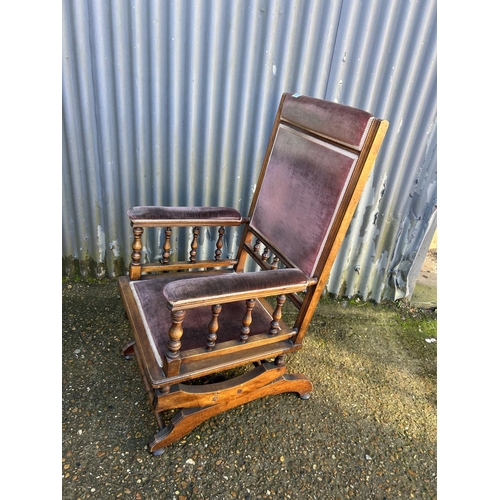 207 - An Edwardian mahogany framed spring rocking chair