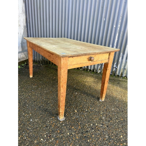 209 - A rustic pine kitchen table with a drawer 82x137x75