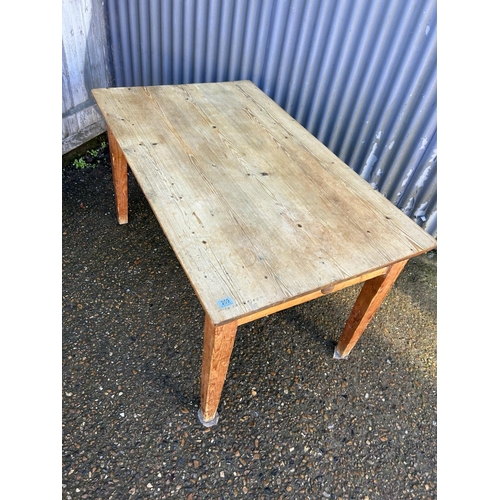 209 - A rustic pine kitchen table with a drawer 82x137x75