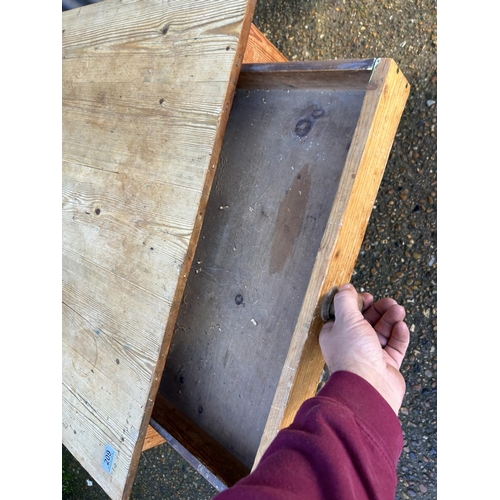 209 - A rustic pine kitchen table with a drawer 82x137x75