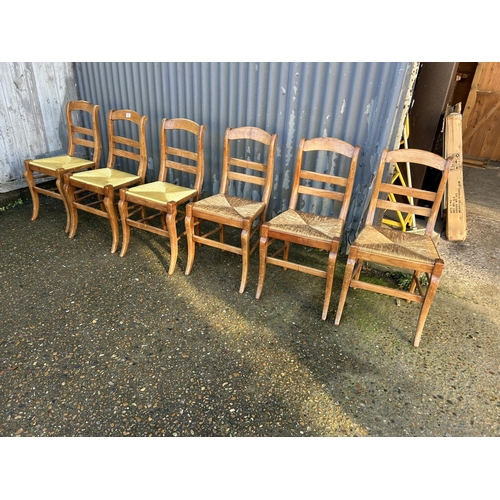 211 - A set of 6 French pine kitchen chairs with rush seats