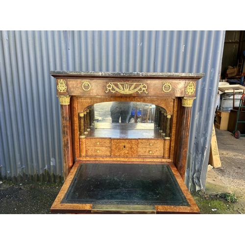 212 - A continental mahogany escritoire cabinet with drop front revealing satinwood interior, fitted with ... 