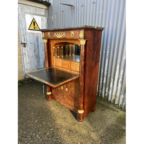 212 - A continental mahogany escritoire cabinet with drop front revealing satinwood interior, fitted with ... 