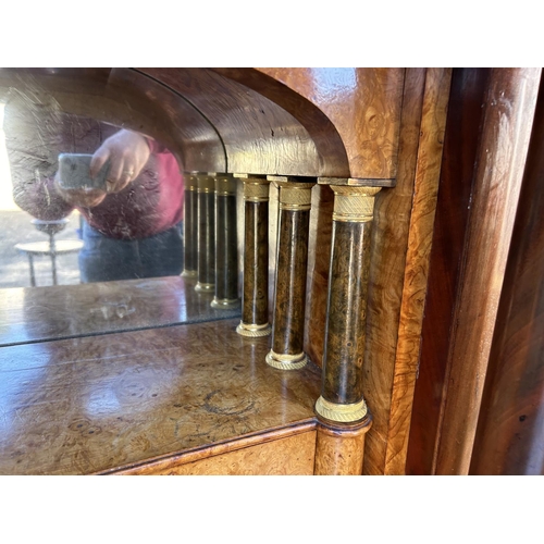 212 - A continental mahogany escritoire cabinet with drop front revealing satinwood interior, fitted with ... 