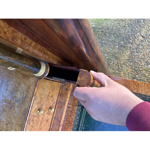 212 - A continental mahogany escritoire cabinet with drop front revealing satinwood interior, fitted with ... 