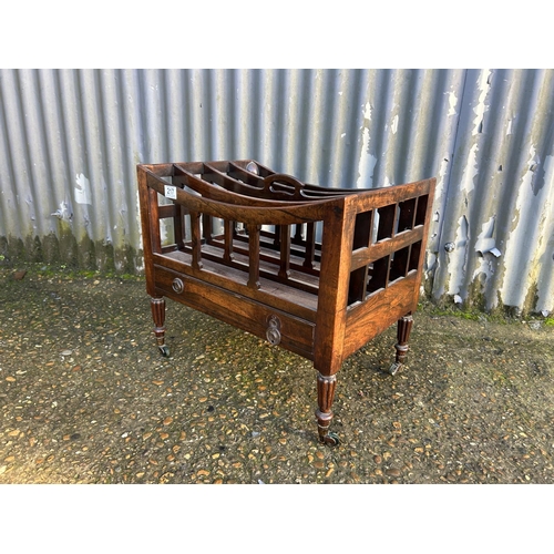 217 - A Victorian rosewood Canterbury book rack 55x38x48