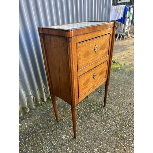 218 - A French mahogany two drawer chest with marble top  57x28x90