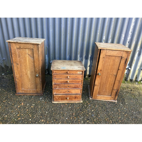 223 - Two pine single door cupboards and a chest of six drawers