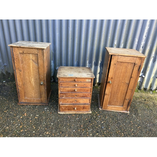 223 - Two pine single door cupboards and a chest of six drawers