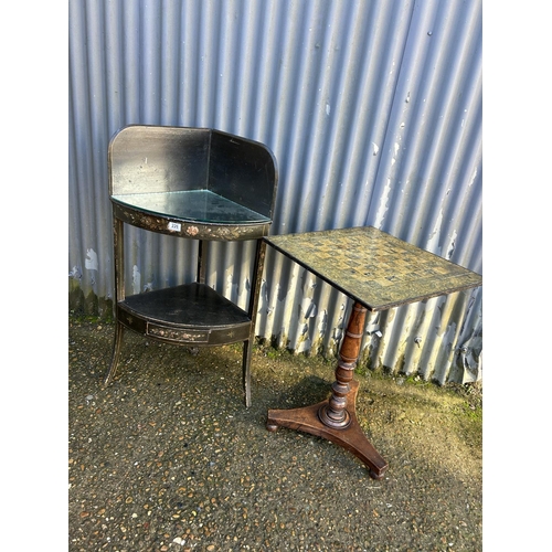 226 - A painted rosewood games table and a corner washstand