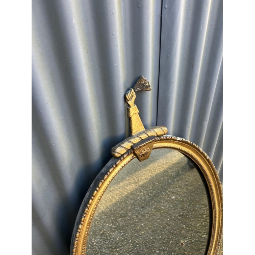 230 - An ornate gold gilt mirror 58x100