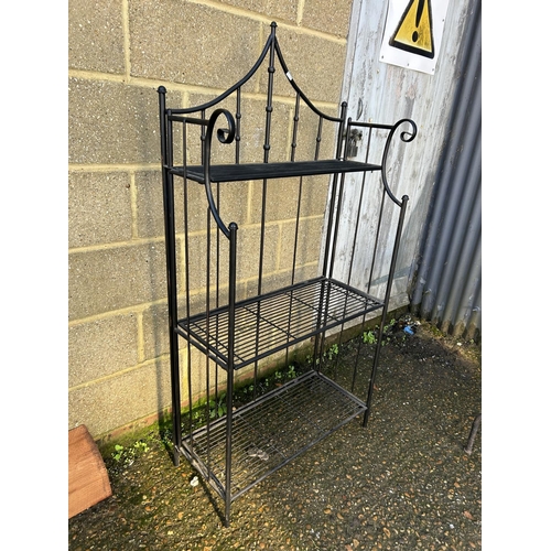 235 - A folding iron three tier shelf 73x30x150