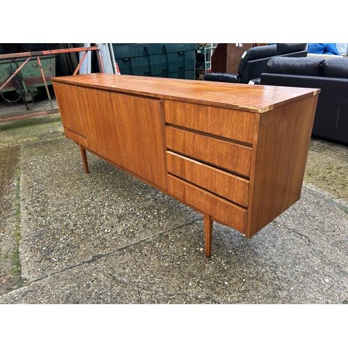 3 - A Mid century teak cocktail sideboard