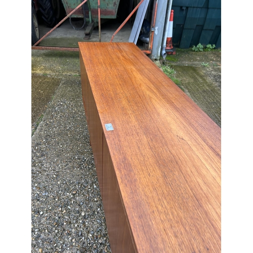 3 - A Mid century teak cocktail sideboard