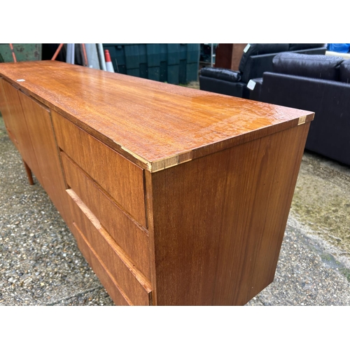 3 - A Mid century teak cocktail sideboard