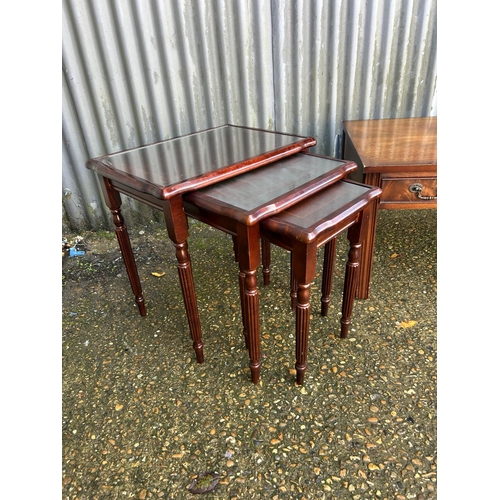 34 - Repro mahogany nest of three and a mahogany three drawer coffee table