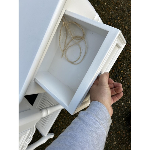 37 - A pair of white painted single drawer bedsides