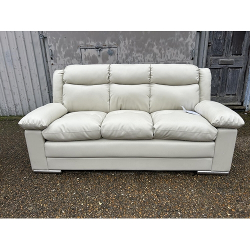 4 - As new ex shop display leather effect 3 seater sofa, 196 wide