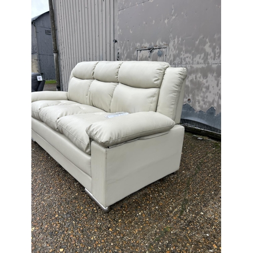 4 - As new ex shop display leather effect 3 seater sofa, 196 wide