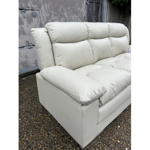 4 - As new ex shop display leather effect 3 seater sofa, 196 wide