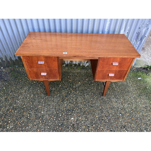 42 - A danish style teak kneehole desk 123x50x74