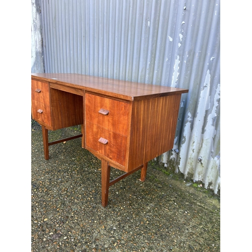 42 - A danish style teak kneehole desk 123x50x74