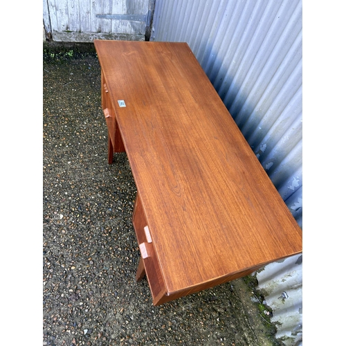 42 - A danish style teak kneehole desk 123x50x74