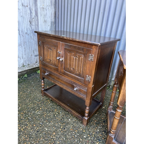 47 - An oak two drawer sideboard together with a oak two door cupboard