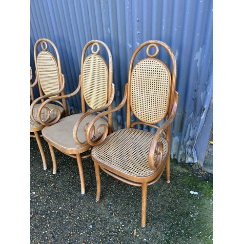 48 - A set of four bentwood carver chairs (one AF to seat)