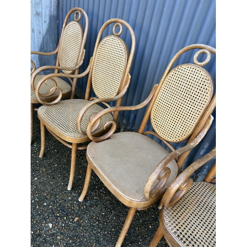 48 - A set of four bentwood carver chairs (one AF to seat)