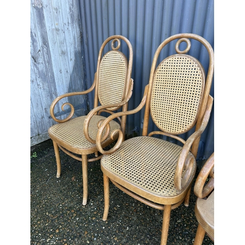 48 - A set of four bentwood carver chairs (one AF to seat)