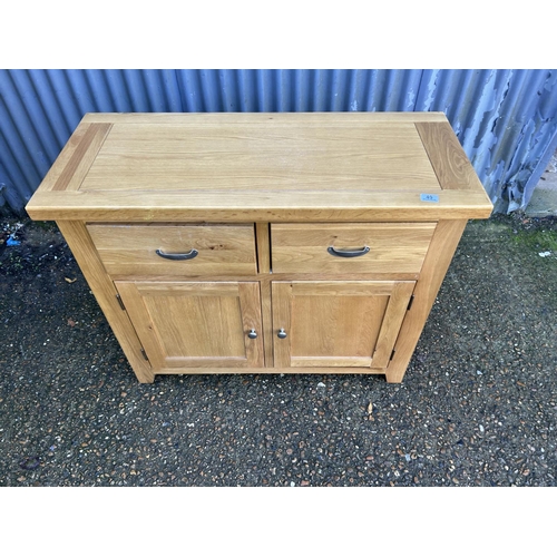 49 - A light oak two drawer sideboard 105x44x87