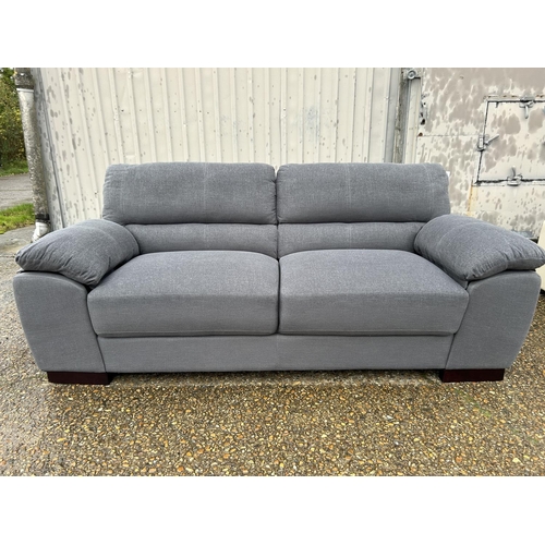 5 - As new ex shop display grey upholstered sofa 200 cms wide