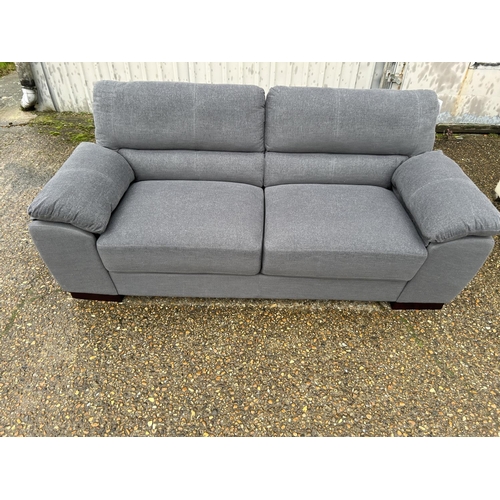 5 - As new ex shop display grey upholstered sofa 200 cms wide