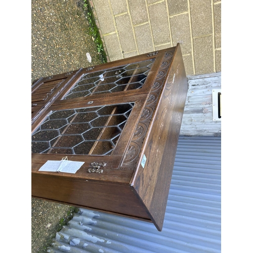 52 - A leaded oak cabinet 100x32x135