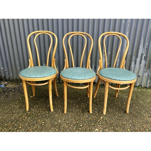 53 - Three bentwood chairs