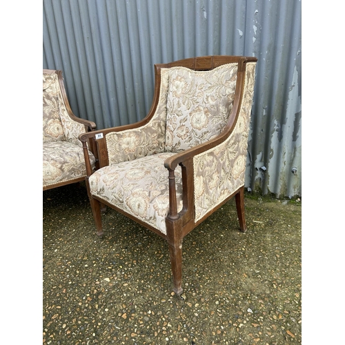 64 - A pair of Edwardian mahogany framed salon chairs