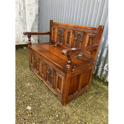 70 - An oak monks bench seat 97cm wide