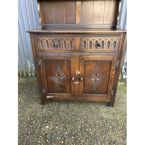 73 - A oak linenfold dresser 90x45x175