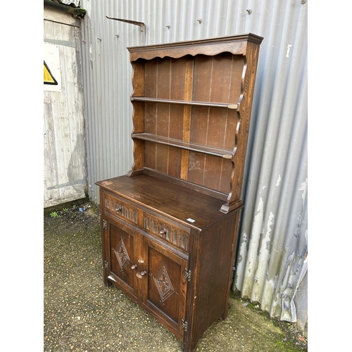 73 - A oak linenfold dresser 90x45x175